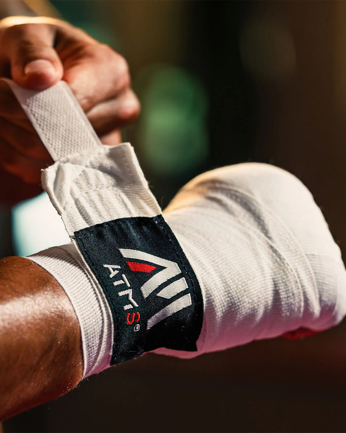 Handwrap with neoprene reinforcement